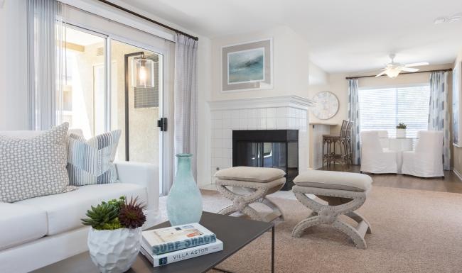 a living room with a fireplace