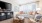 a living room with a tv and couches