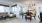 a living room with a table and chairs