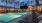 a pool with chairs around it